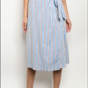 Blue midi skirt with red and white stripes.